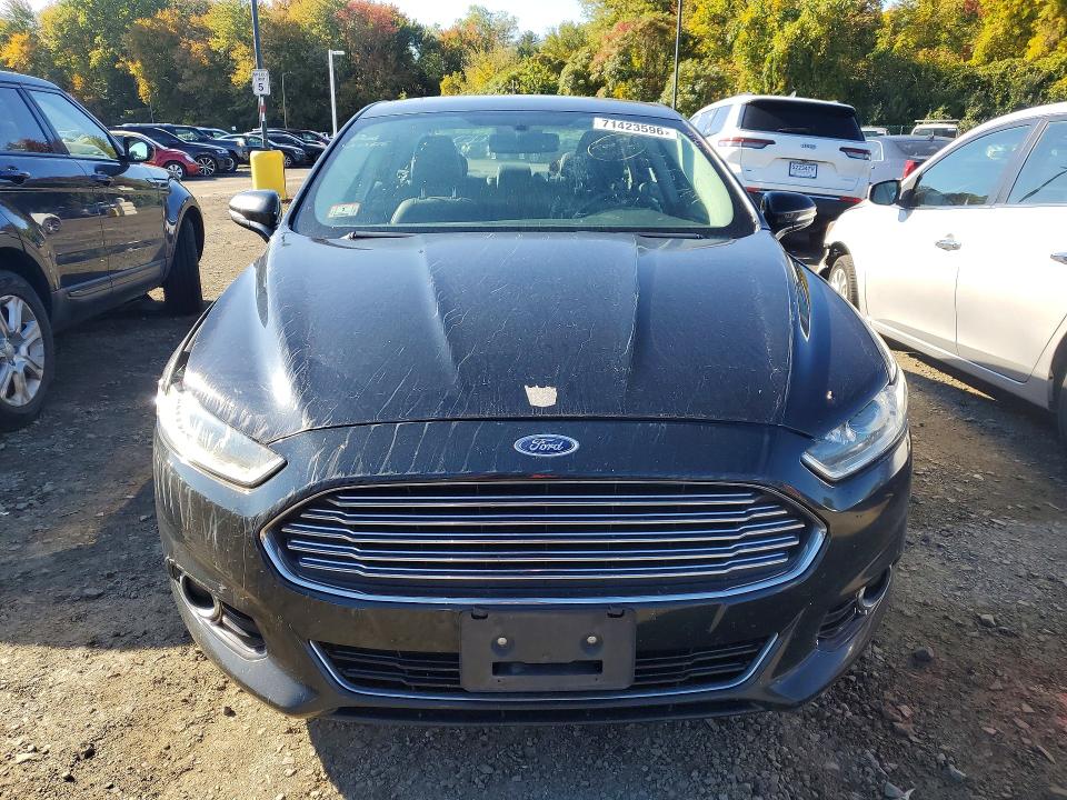 Photo 5 from auction – 2014 FORD FUSION with VIN 3FA6P0RU3ER125132