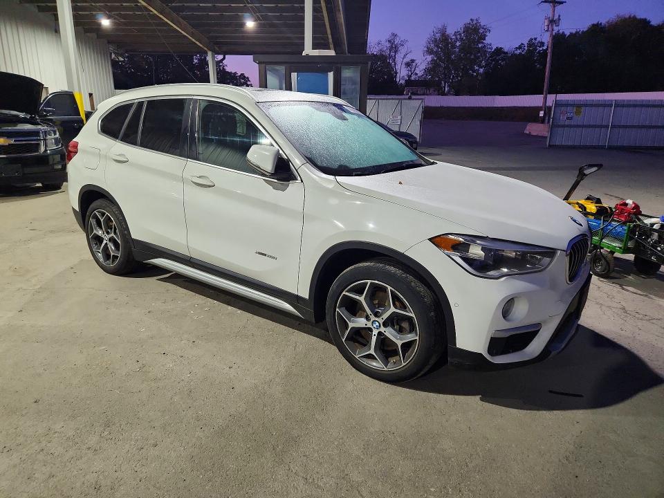 Снимка 4 от търг – 2016 BMW X1 с VIN WBXHT3C33G5E47944