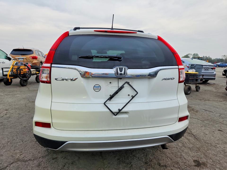 Photo 6 from auction – 2016 HONDA CR-V with VIN 5J6RM4H72GL046453