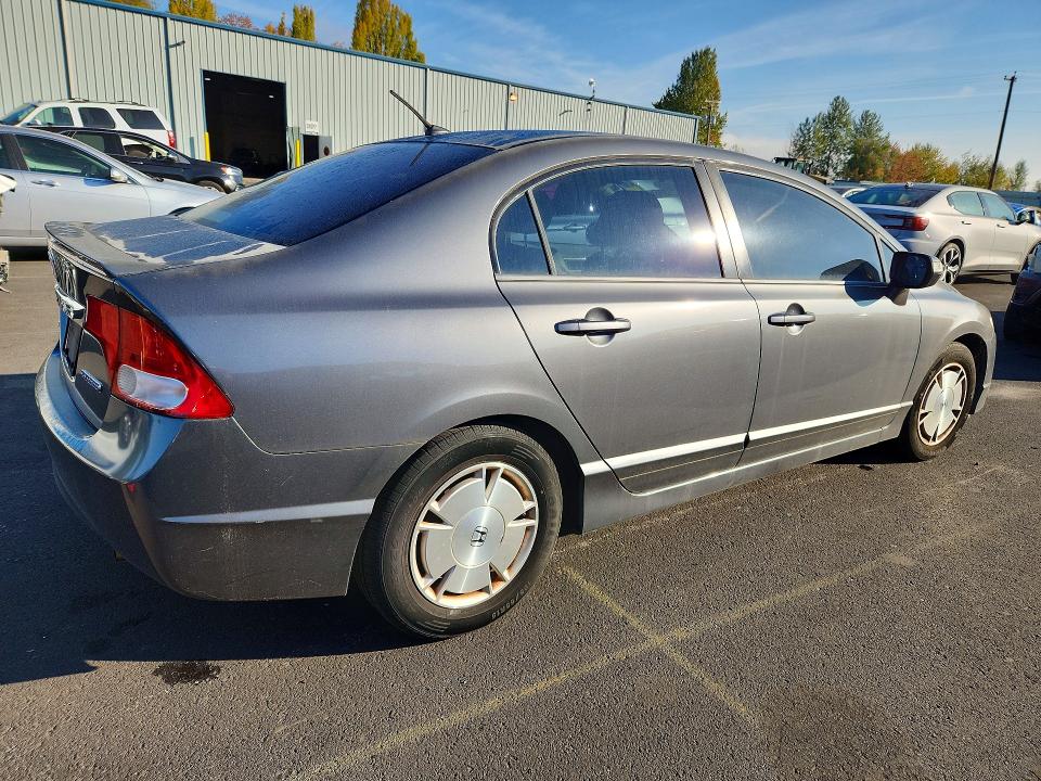 Photo 3 from auction – 2010 HONDA CIVIC with VIN JHMFA3F29AS007440