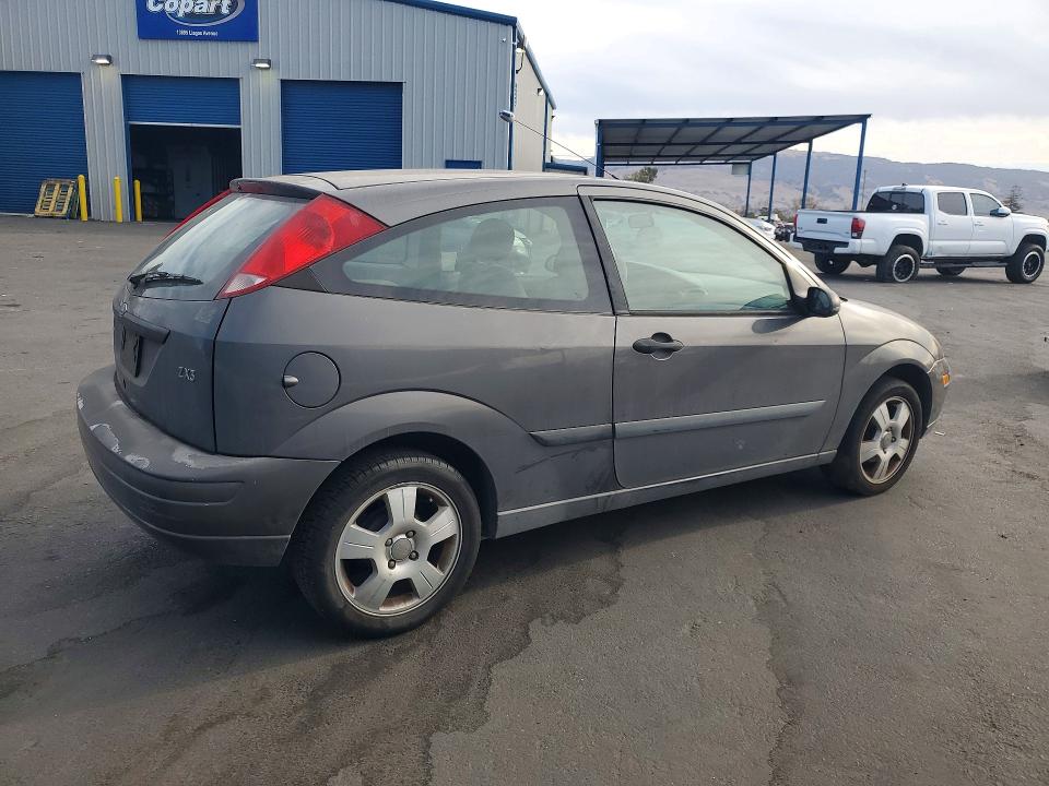 Photo 3 from auction – 2004 FORD FOCUS with VIN 3FAFP31Z84R116613