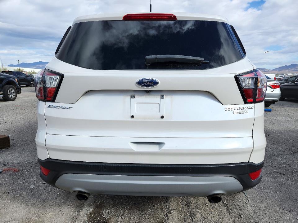 Снимка 6 от търг – 2017 FORD ESCAPE с VIN 1FMCU0J93HUD54299