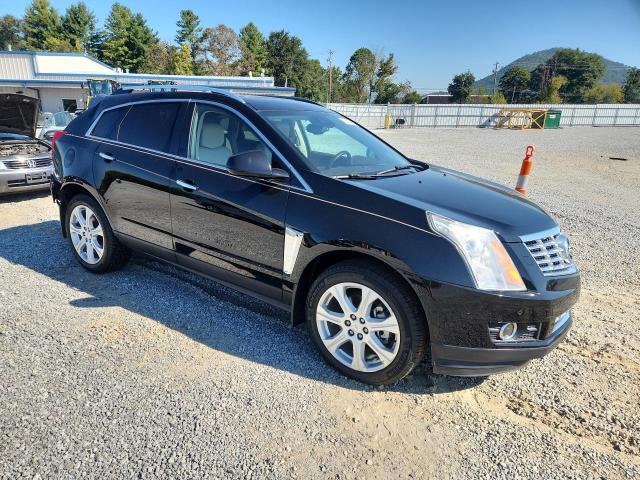 Снимка 4 от търг – 2014 CADILLAC SRX с VIN 3GYFNDE39ES650123