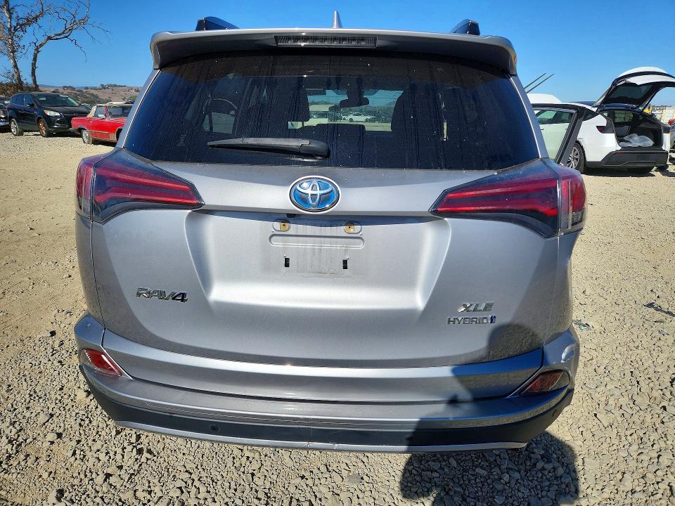 Снимка 6 от търг – 2018 TOYOTA RAV4 HYBRID с VIN JTMRJREV2JD192206