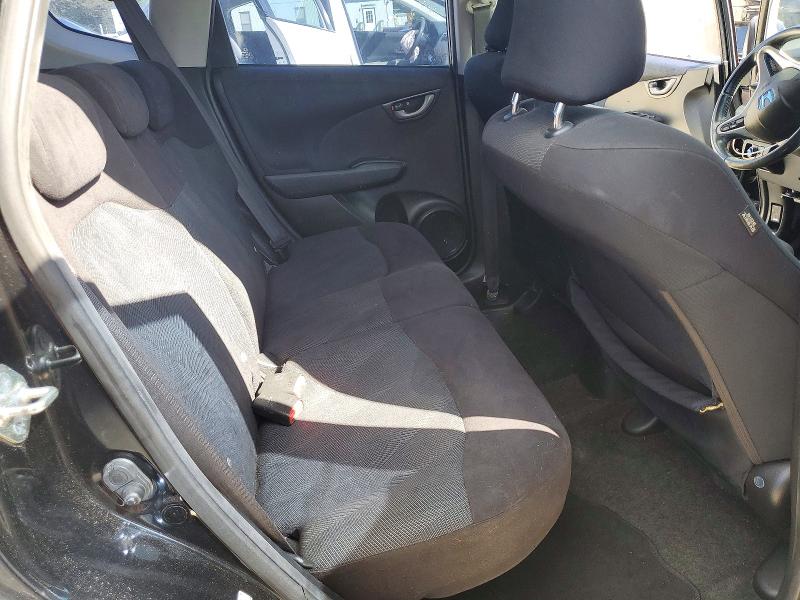 Снимка 10 от търг – 2009 HONDA FIT с VIN JHMGE87499S015359