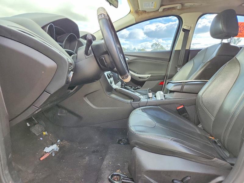 Снимка 7 от търг – 2014 FORD FOCUS с VIN 1FADP3K21EL142592