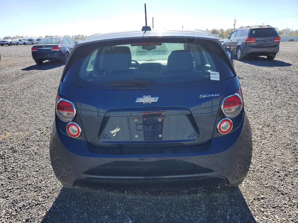 Снимка 6 от търг – 2015 CHEVROLET SONIC с VIN 1G1JA6SH4F4180892