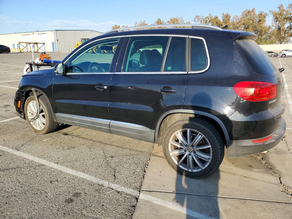 Снимка 2 от търг – 2012 VOLKSWAGEN TIGUAN с VIN WVGAV7AX8CW510331