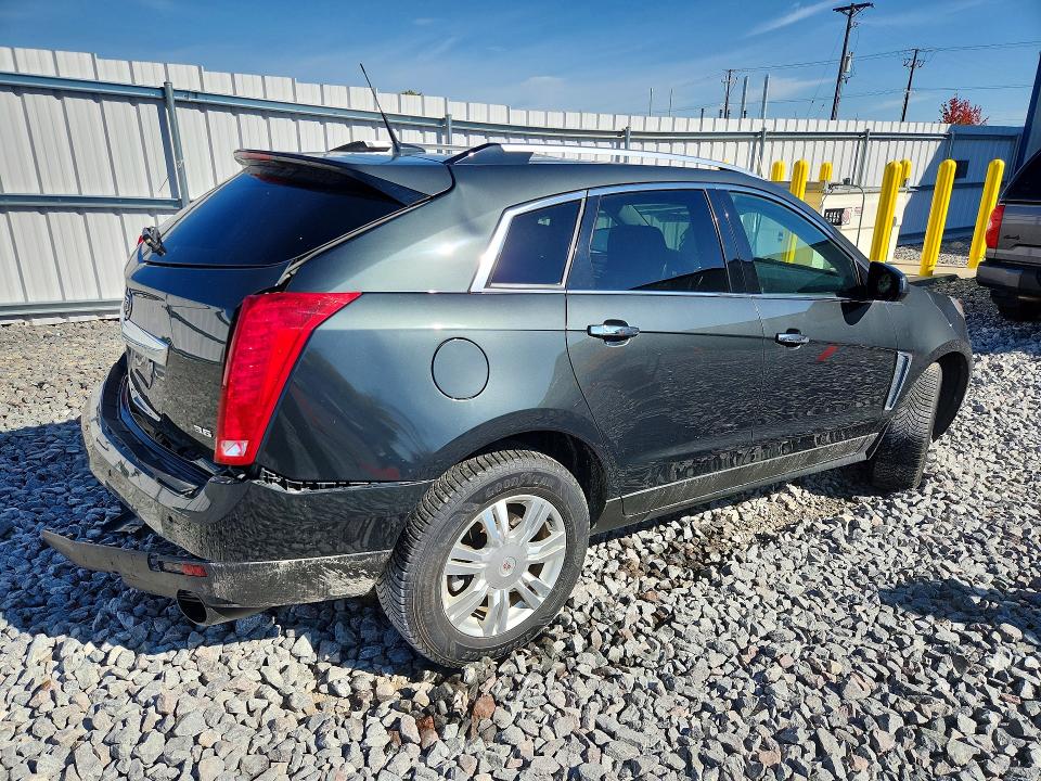 Foto 3 de la subasta – 2014 CADILLAC SRX con VIN 3GYFNBE31ES686621