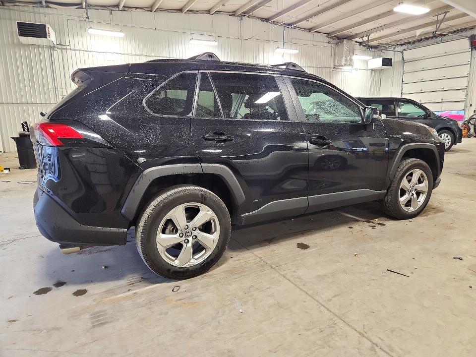 Снимка 3 от търг – 2021 TOYOTA RAV4 HYBRID с VIN 4T3B6RFV3MU049032