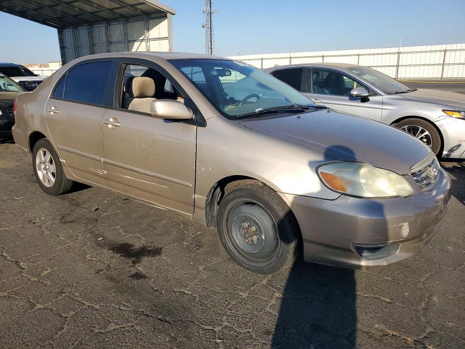 Снимка 4 от търг – 2004 TOYOTA COROLLA с VIN 1NXBR38E34Z328278