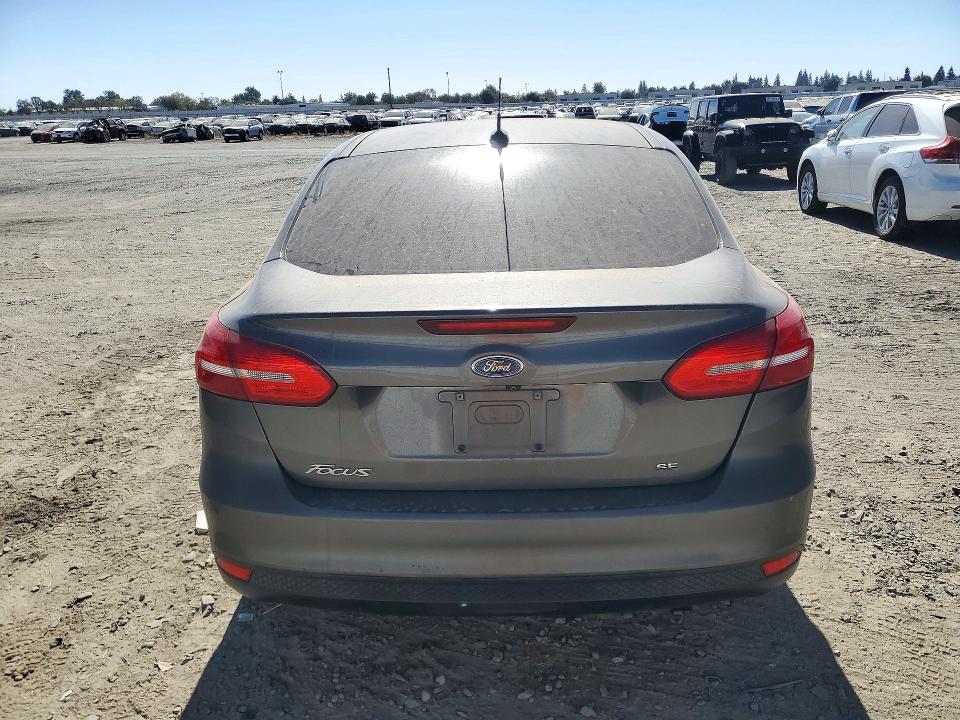 Снимка 6 от търг – 2016 FORD FOCUS с VIN 1FADP3F27GL263169