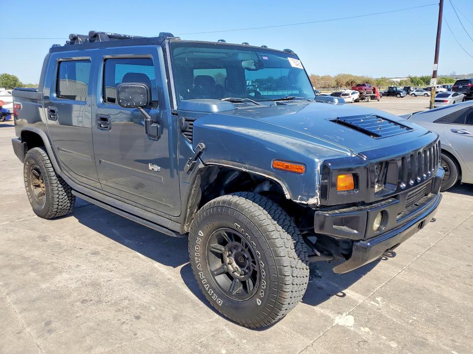 Photo 4 from auction – 2005 HUMMER H2 SUT with VIN 5GRGN22U15H112244