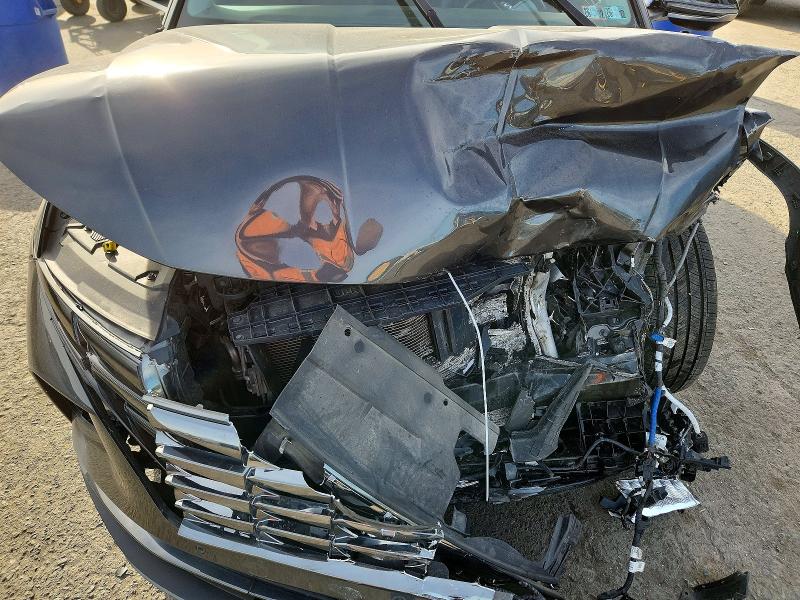 Photo 12 from auction – 2023 HYUNDAI TUCSON with VIN 5NMJECAEXPH192569
