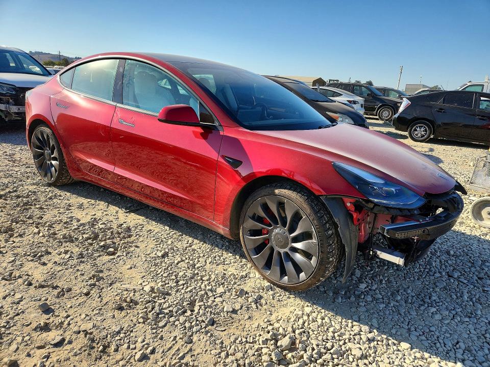 Photo 4 from auction – 2021 TESLA MODEL 3 with VIN 5YJ3E1EC4MF936329