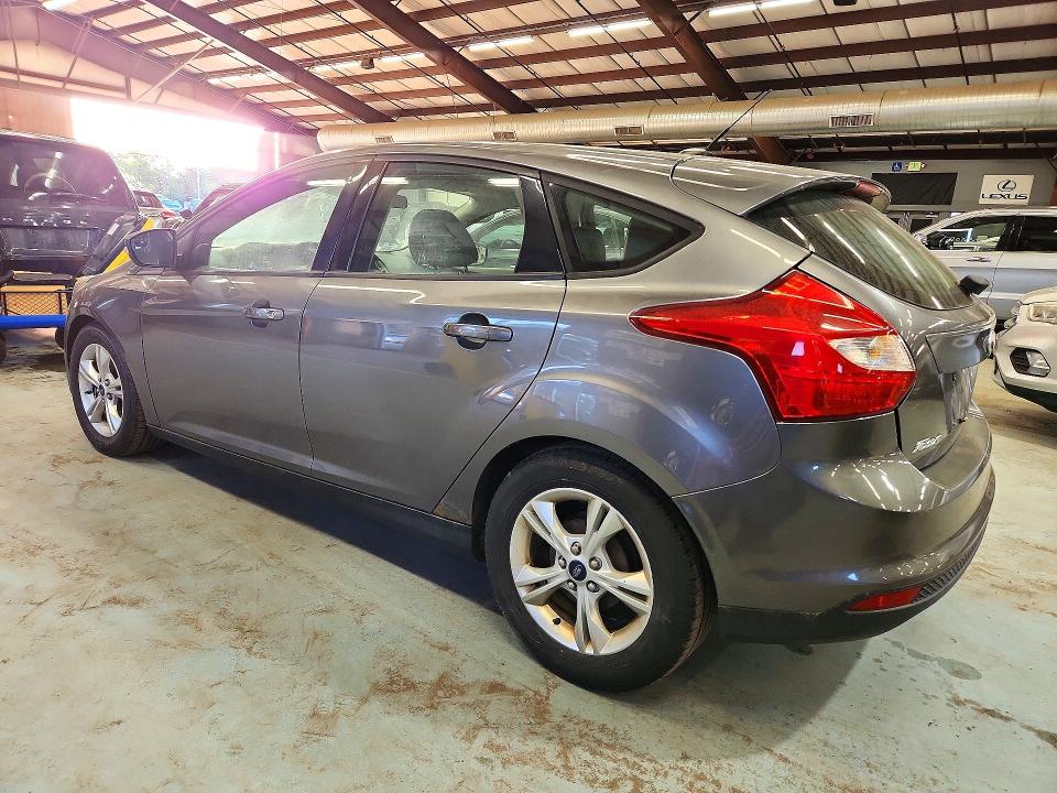 Снимка 2 от търг – 2014 FORD FOCUS с VIN 1FADP3K22EL178386