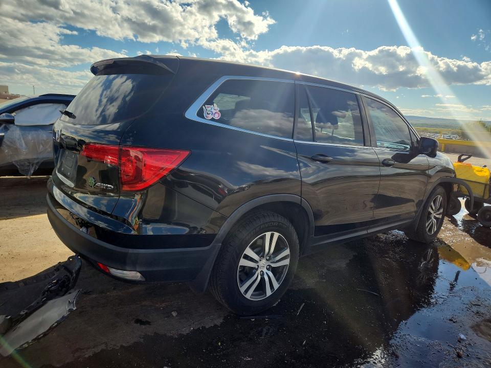Снимка 3 от търг – 2016 HONDA PILOT с VIN 5FNYF6H88GB077256
