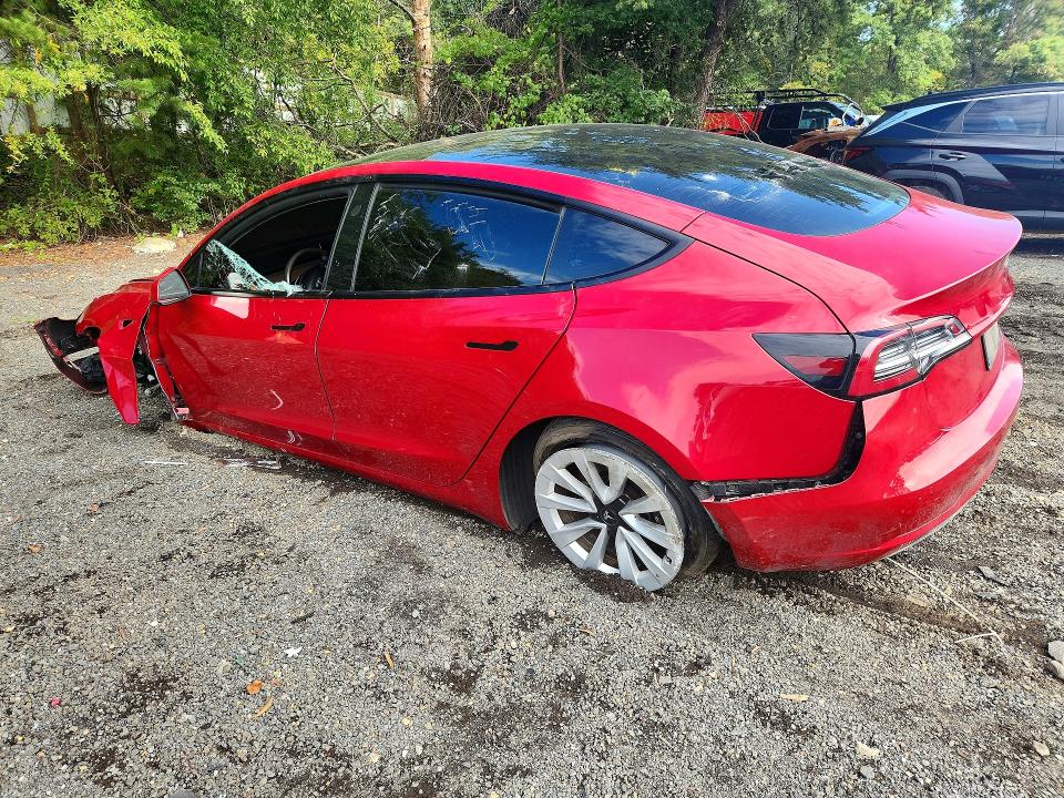 Снимка 2 от търг – 2022 TESLA MODEL 3 с VIN 5YJ3E1EAXNF370418
