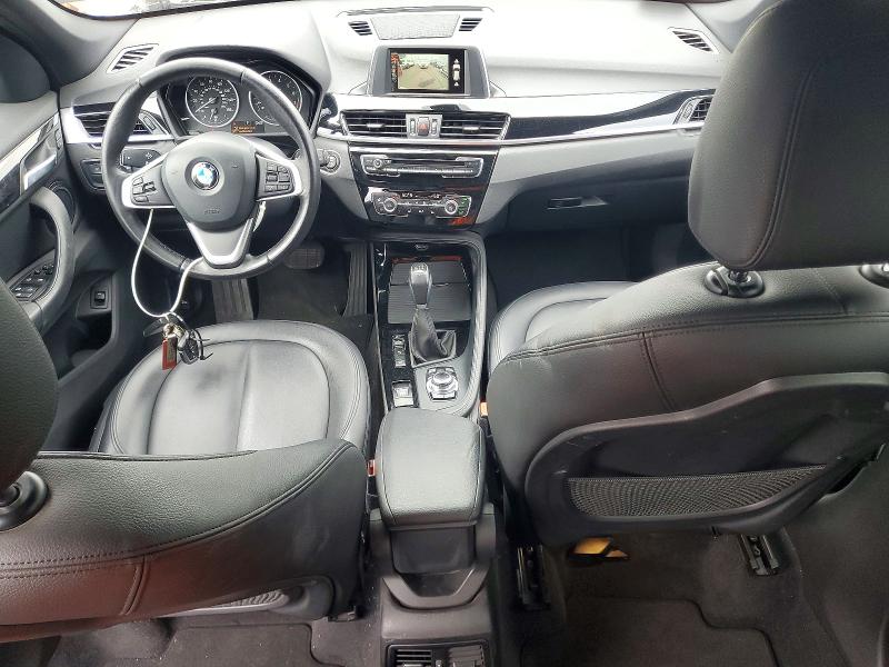Photo 8 from auction – 2016 BMW X1 with VIN WBXHT3C34G5E51596