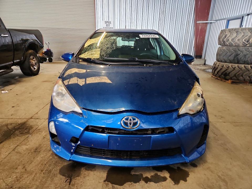Снимка 5 от търг – 2012 TOYOTA PRIUS C с VIN JTDKDTB39C1017450