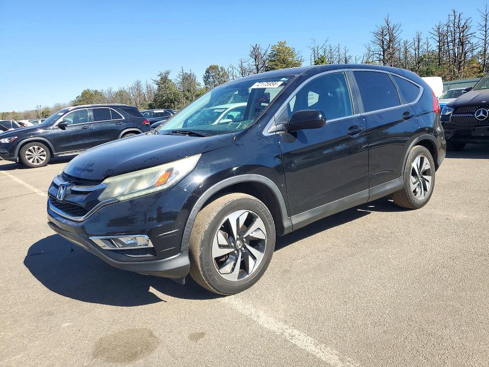 Photo 1 from auction – 2016 HONDA CR-V with VIN 2HKRM4H58GH634740