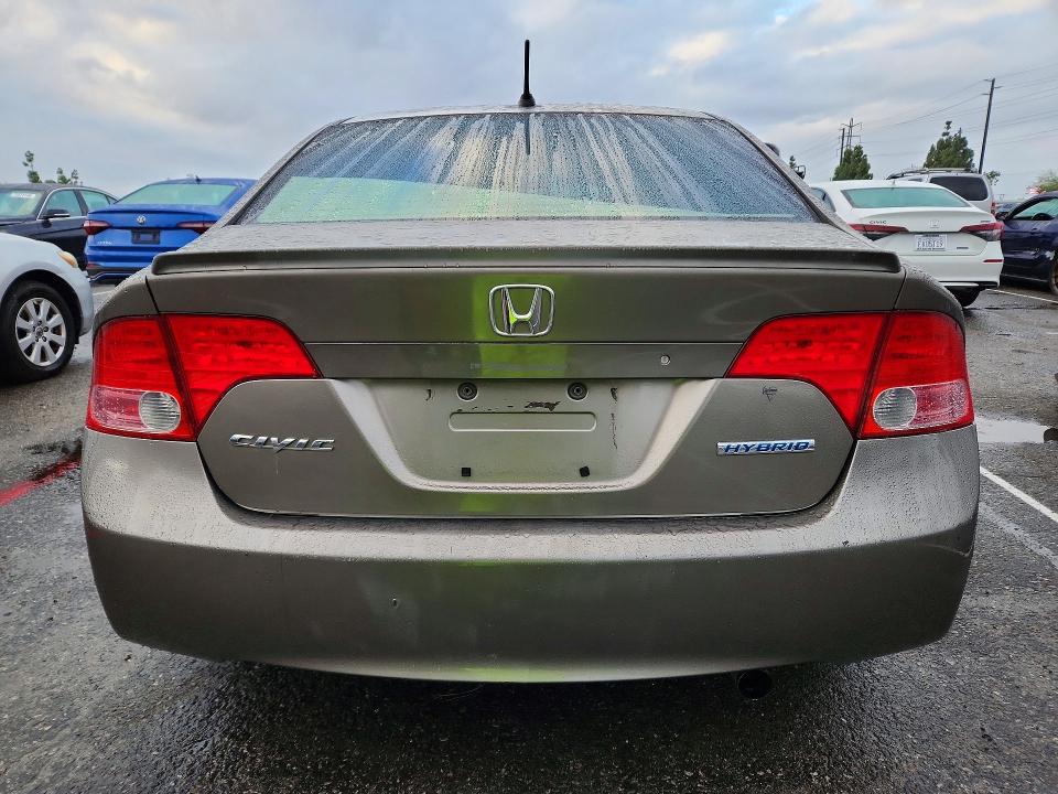 Photo 6 from auction – 2007 HONDA CIVIC with VIN JHMFA36207S013992