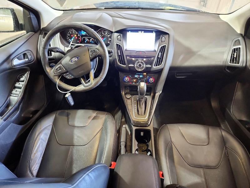 Foto 8 de la subasta – 2017 FORD FOCUS con VIN 1FADP3N24HL316929