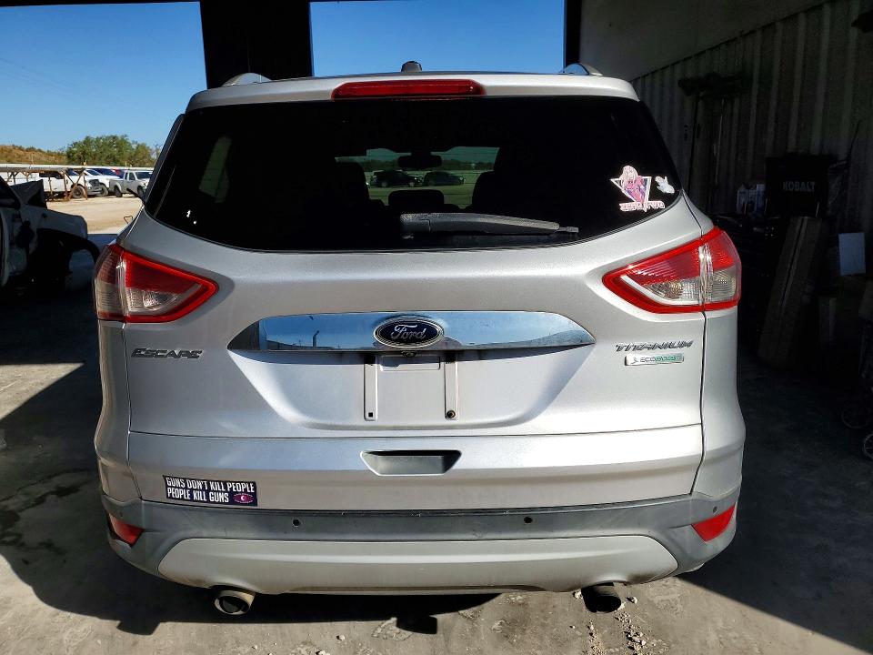 Снимка 6 от търг – 2014 FORD ESCAPE с VIN 1FMCU0J91EUA38086