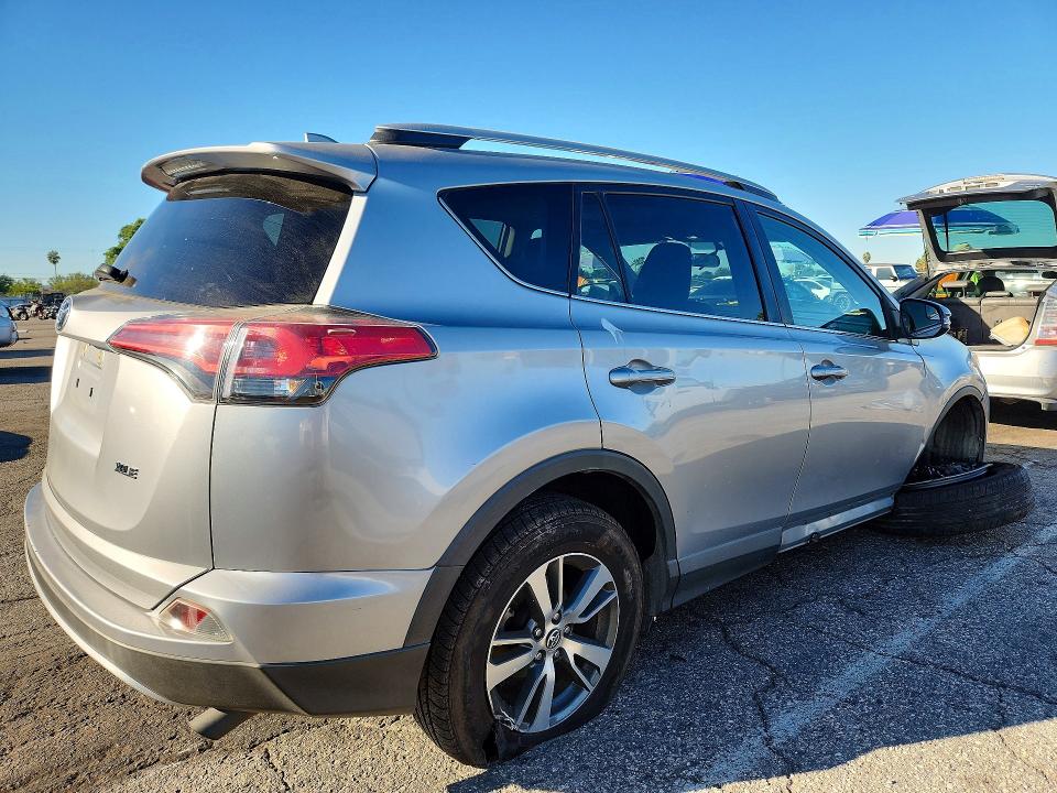 Photo 3 from auction – 2016 TOYOTA RAV4 with VIN 2T3WFREV3GW252798
