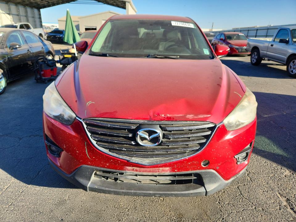 Photo 5 from auction – 2016 MAZDA CX-5 with VIN JM3KE2CY6G0812220
