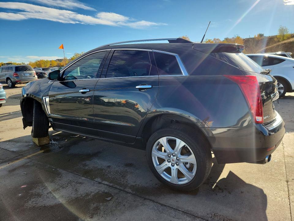 Снимка 2 от търг – 2014 CADILLAC SRX с VIN 3GYFNGE38ES659350