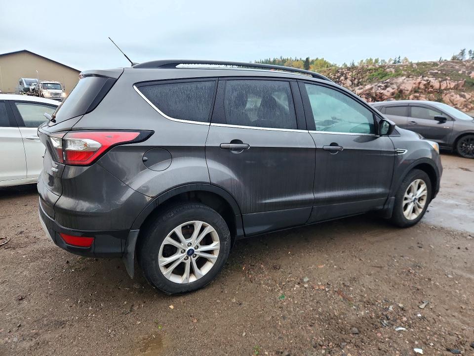 Foto 3 de la subasta – 2018 FORD ESCAPE con VIN 1FMCU9GD3JUA92905