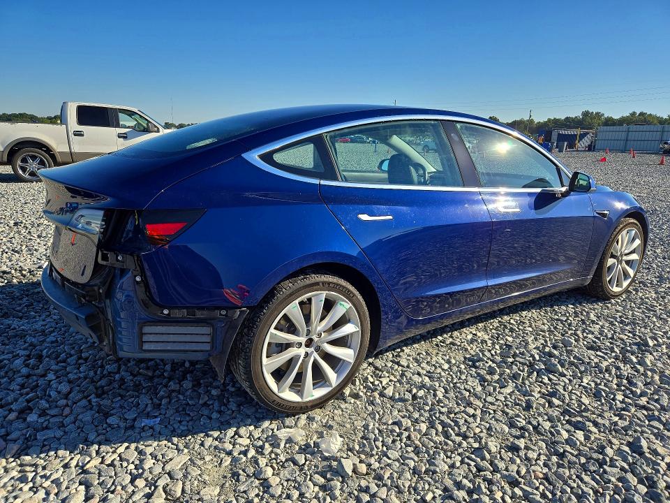 Снимка 3 от търг – 2018 TESLA MODEL 3 с VIN 5YJ3E1EB0JF117398