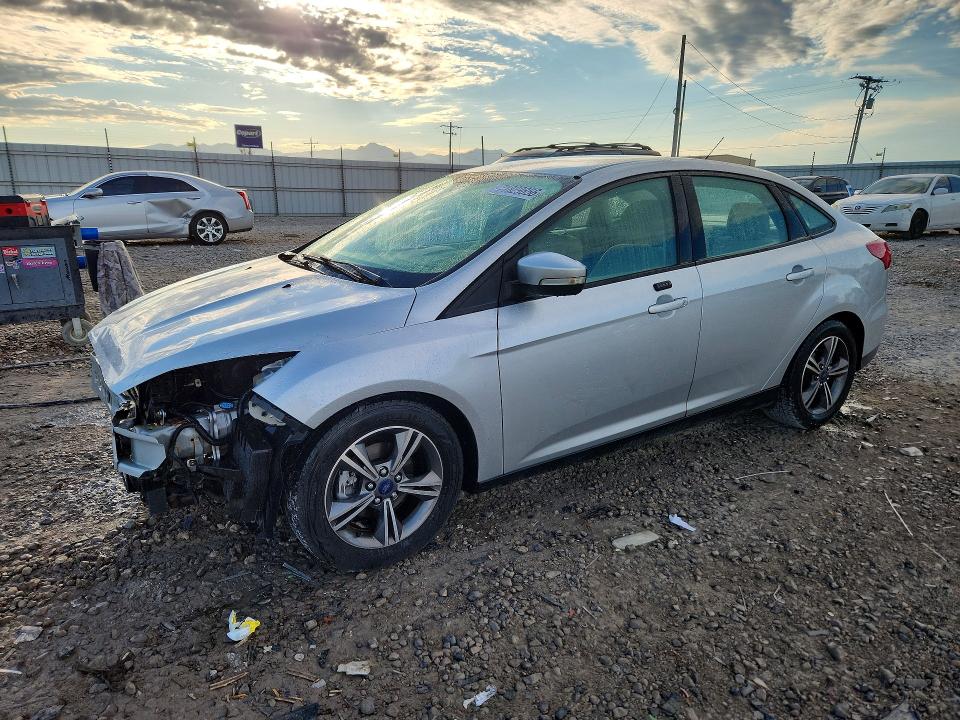 FORD FOCUS 2016 con VIN 1FADP3FE9GL359587 - Foto de la subasta