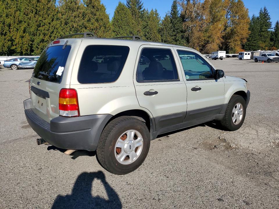Снимка 3 от търг – 2003 FORD ESCAPE с VIN 1FMCU93143KB44567
