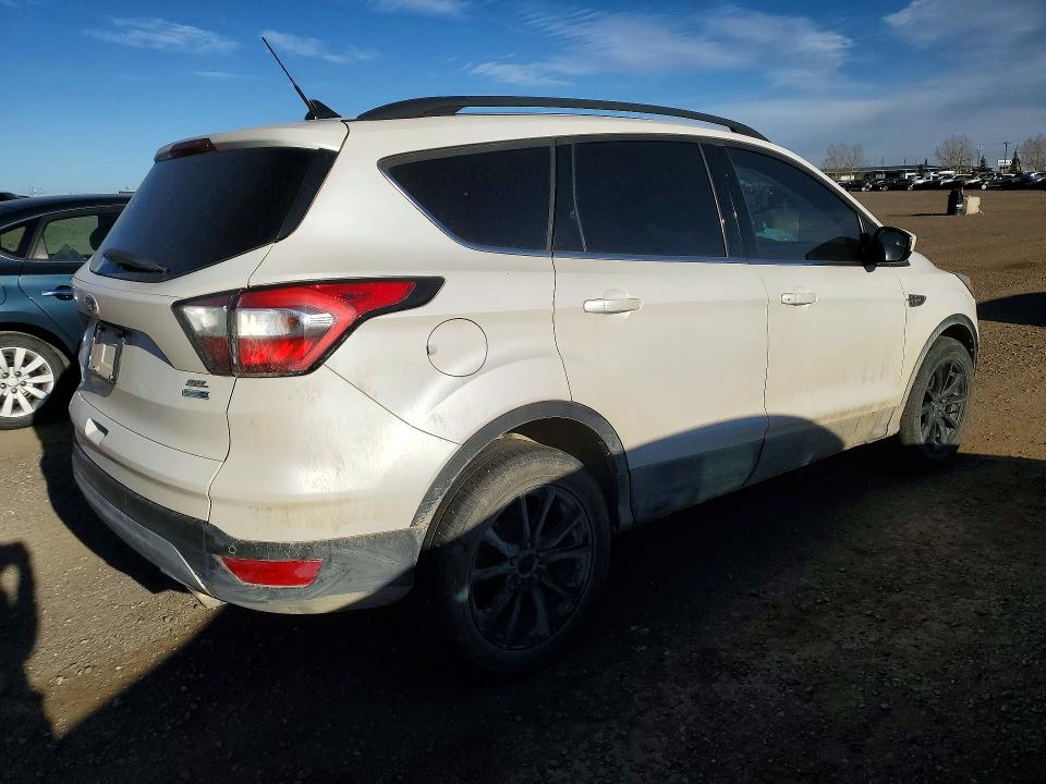 Снимка 3 от търг – 2018 FORD ESCAPE с VIN 1FMCU9H98JUB64630