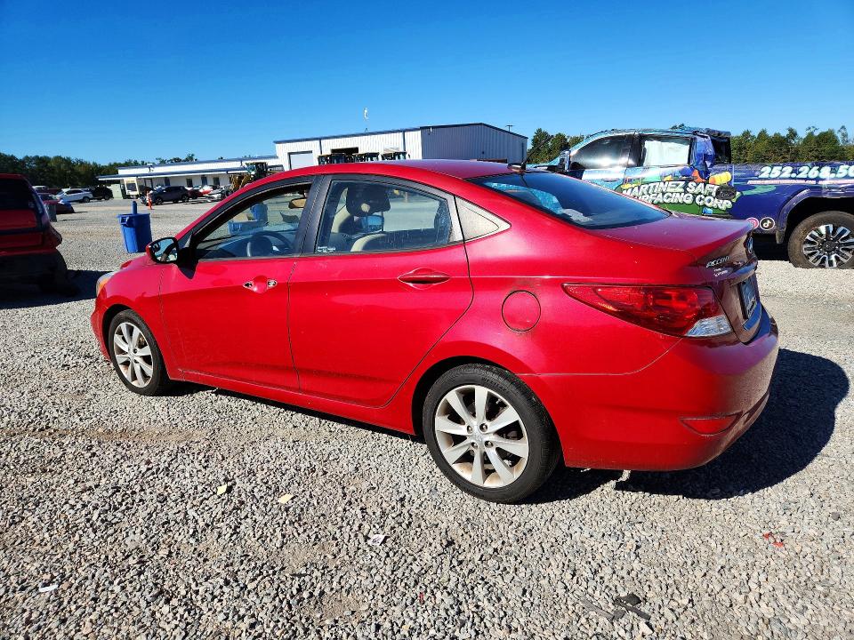 Снимка 2 от търг – 2014 HYUNDAI ACCENT с VIN KMHCU4AE6EU735497