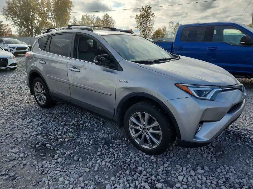 Снимка 4 от търг – 2017 TOYOTA RAV4 HV с VIN JTMDJREV9HD075985