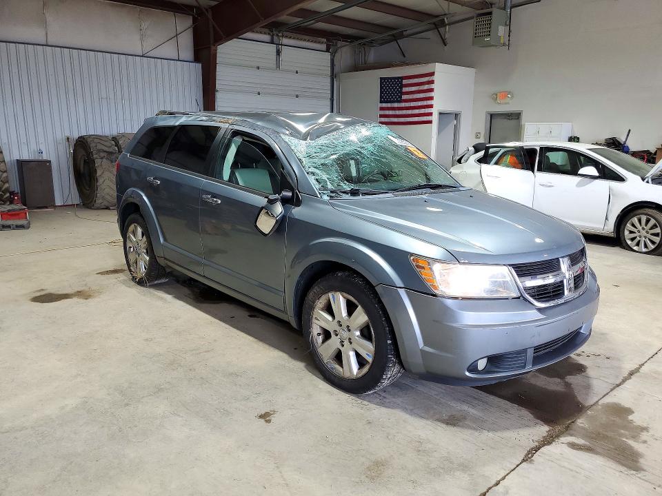 Снимка 4 от търг – 2009 DODGE JOURNEY с VIN 3D4GG67VX9T198006