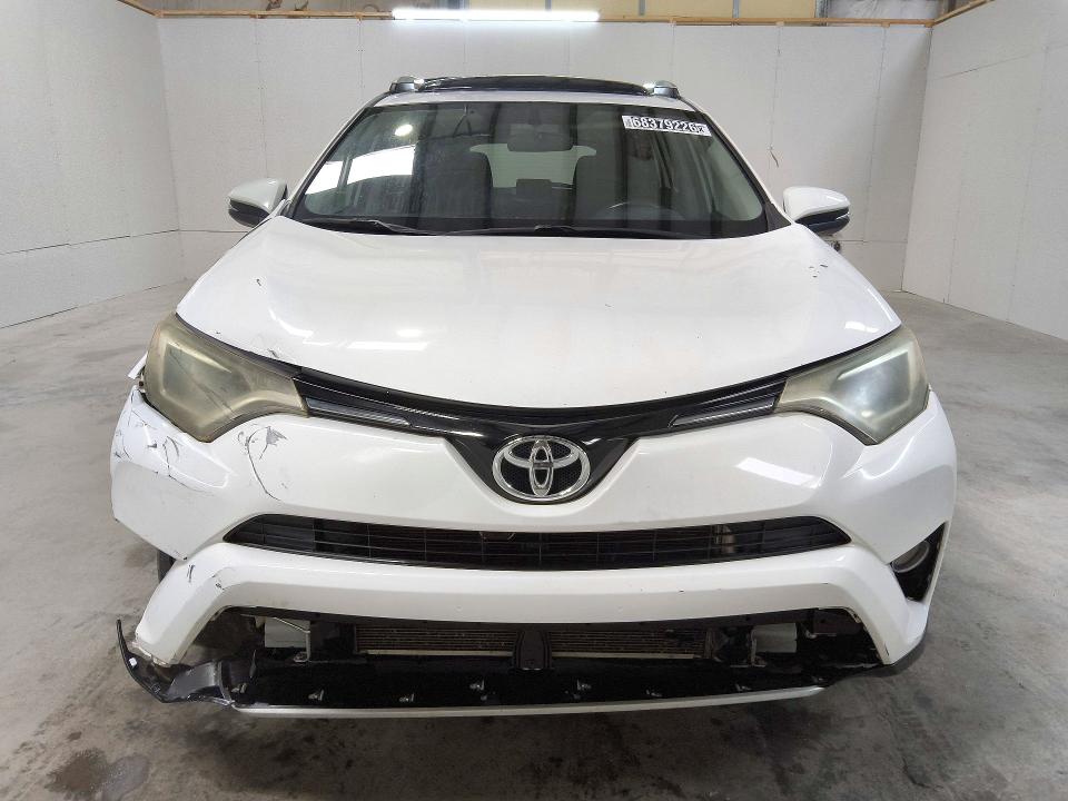 Photo 5 from auction – 2016 TOYOTA RAV4 with VIN 2T3RFREVXGW502261
