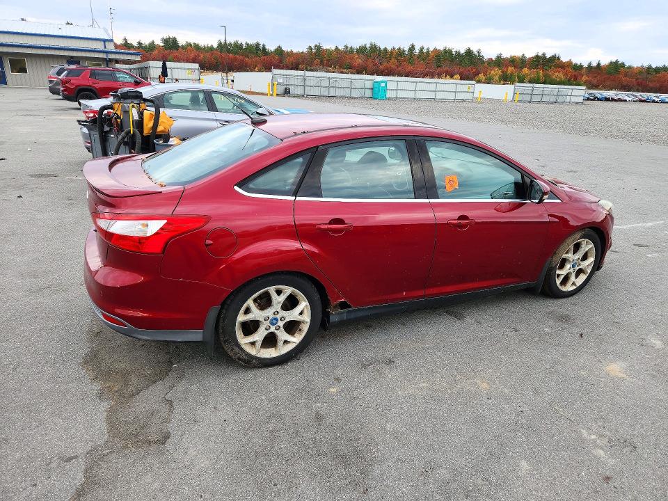 Снимка 3 от търг – 2014 FORD FOCUS с VIN 1FADP3J24EL215133