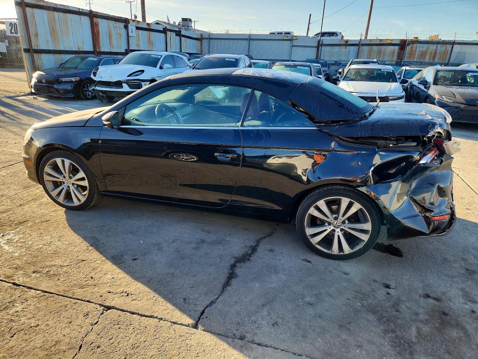 Снимка 2 от търг – 2013 VOLKSWAGEN EOS с VIN WVWFW8AH0DV006966