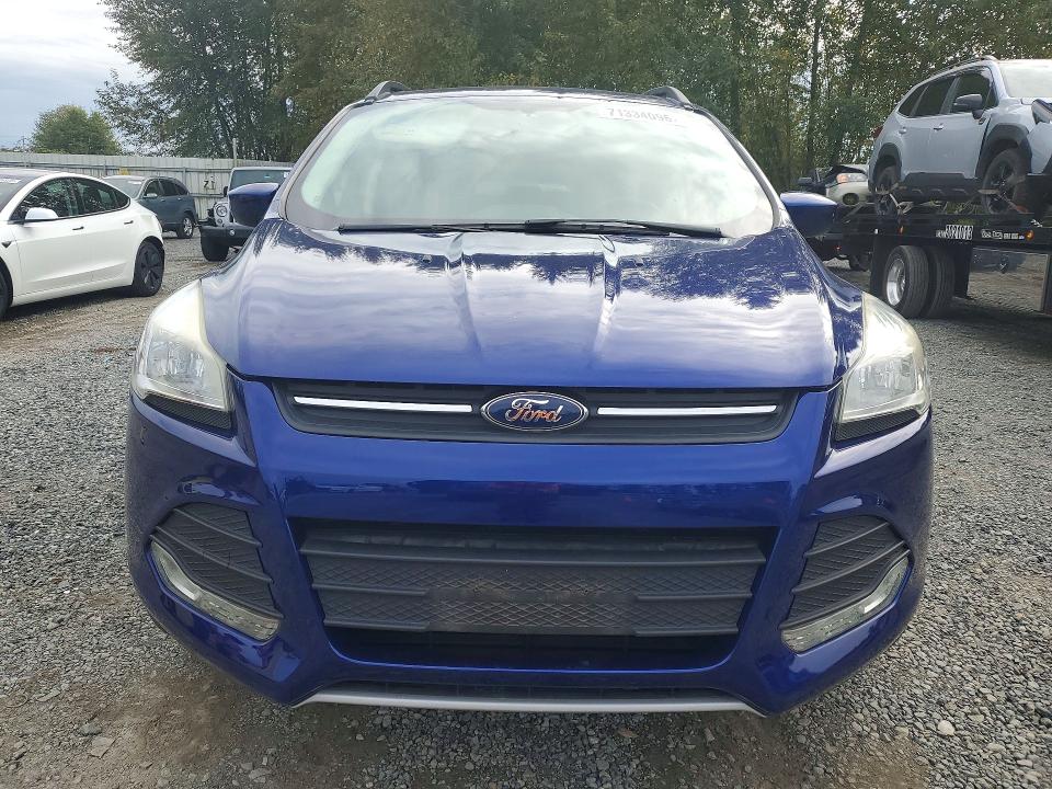 Photo 5 from auction – 2016 FORD ESCAPE with VIN 1FMCU0GX8GUA22265