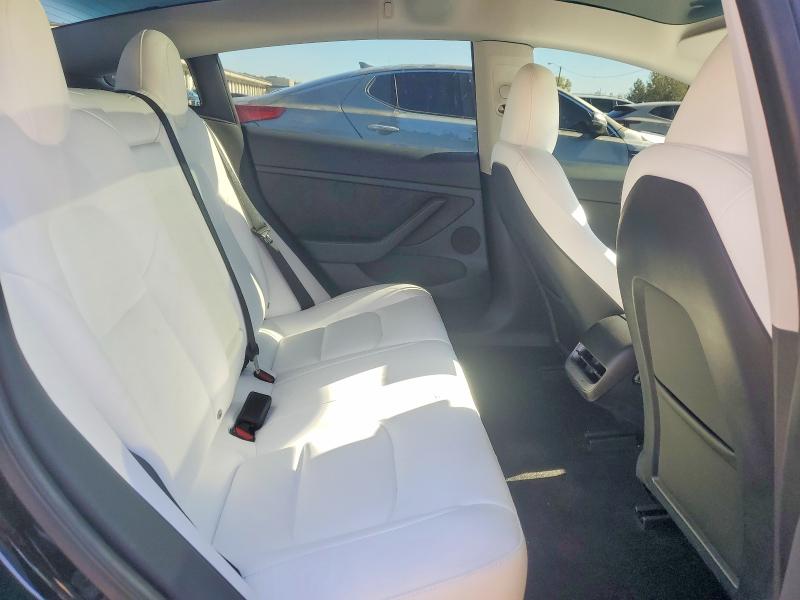Снимка 10 от търг – 2023 TESLA MODEL 3 с VIN 5YJ3E1EC2PF671981