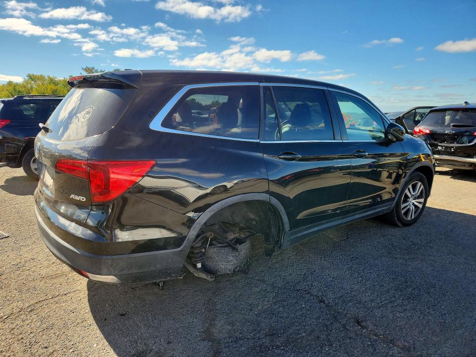 Снимка 3 от търг – 2016 HONDA PILOT с VIN 5FNYF6H32GB119103