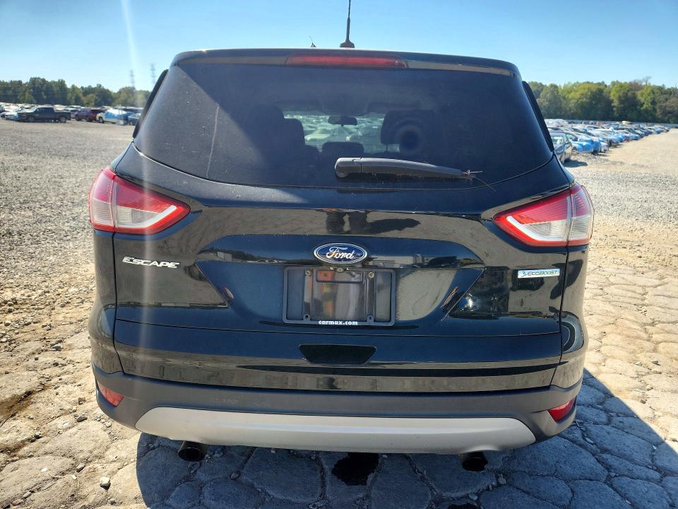 Foto 6 de la subasta – 2014 FORD ESCAPE con VIN 1FMCU0GX1EUD84791