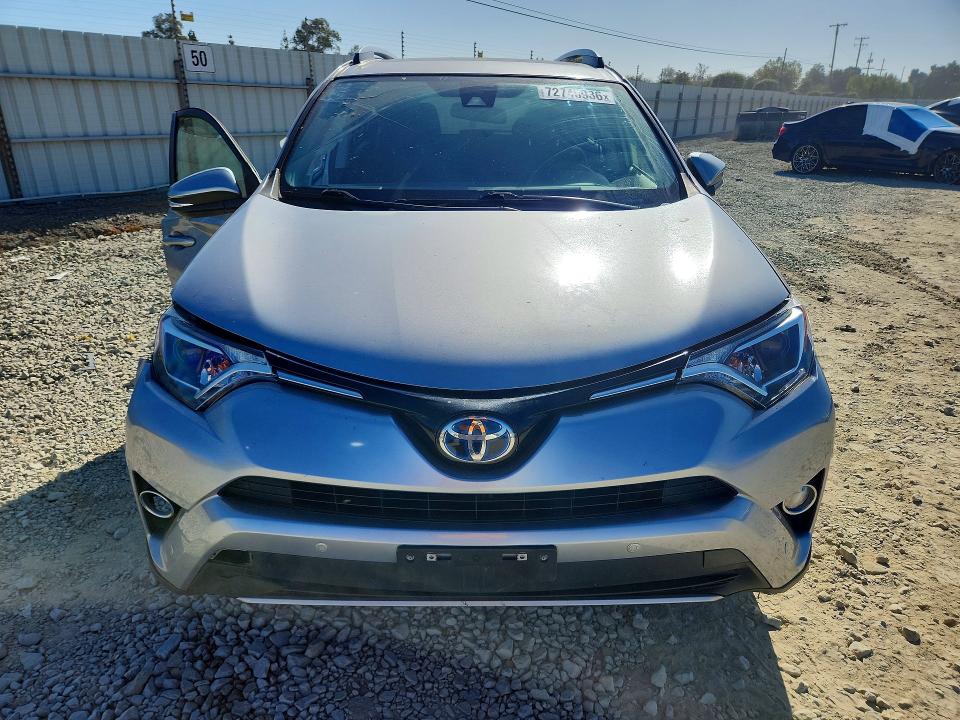 Снимка 5 от търг – 2018 TOYOTA RAV4 HYBRID с VIN JTMRJREV2JD192206