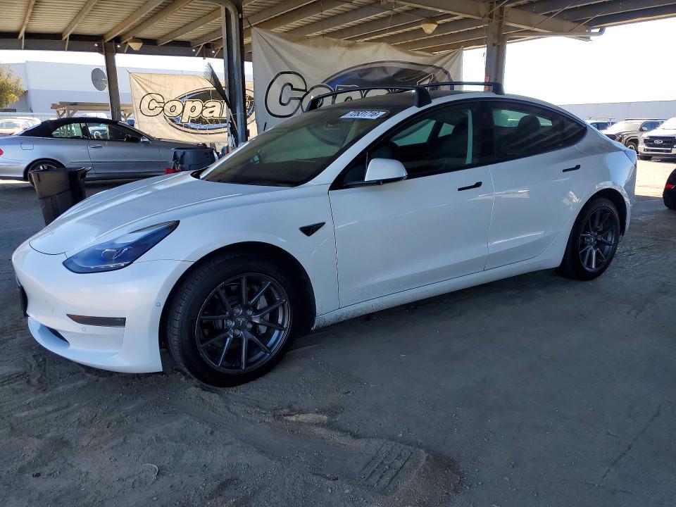 TESLA MODEL 3 2021 with VIN 5YJ3E1EA2MF074789 - Photo from auction