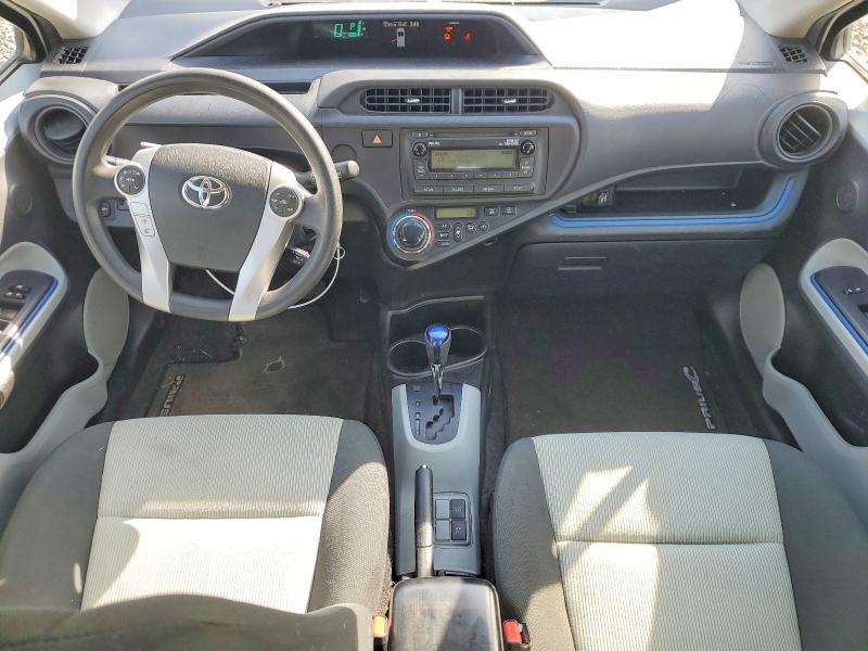 Снимка 8 от търг – 2013 TOYOTA PRIUS C с VIN JTDKDTB3XD1557052