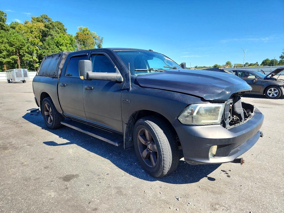 Снимка 4 от търг – 2014 RAM 1500 с VIN 3C6RR6KT5EG248133